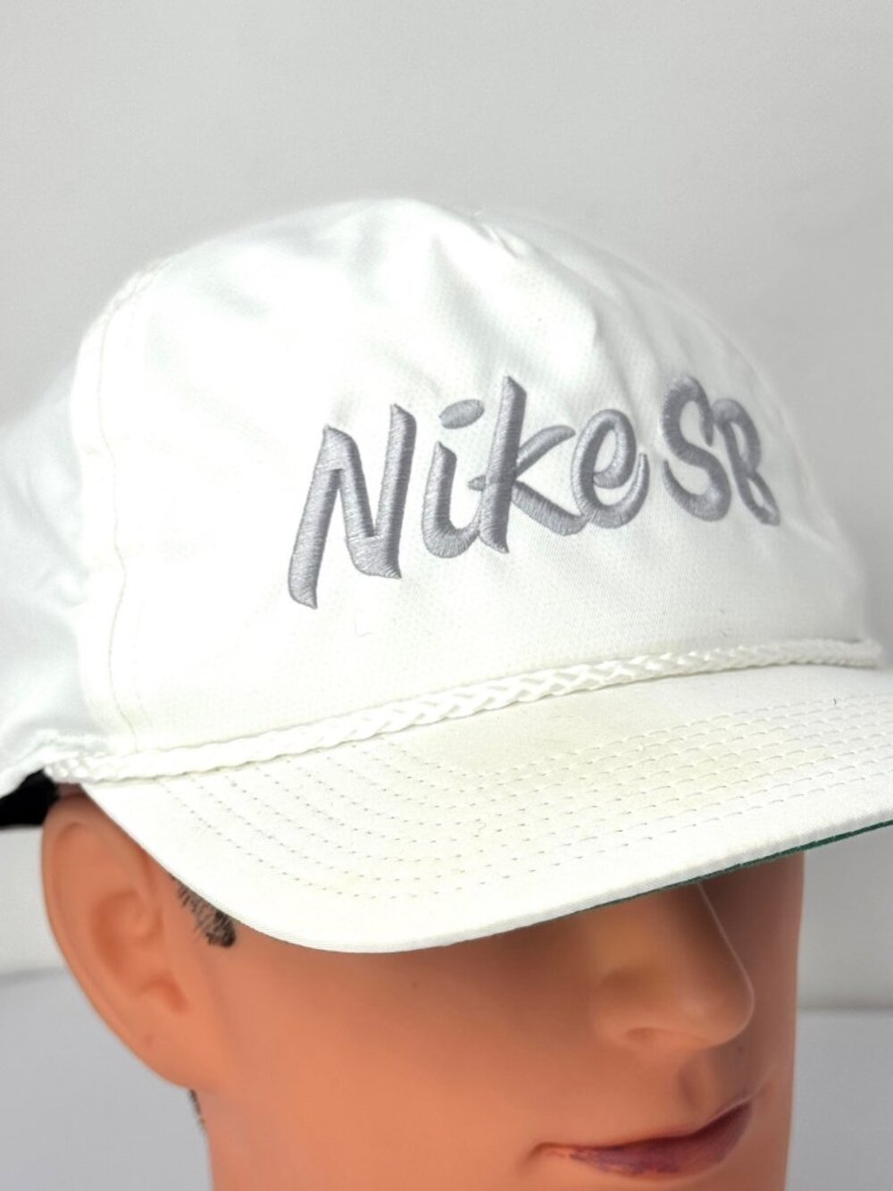 Nike SB White Dri-Fit Adjustable Cap With Green Underbill For Skateboarding